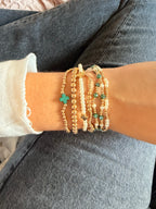 Green bracelet stack