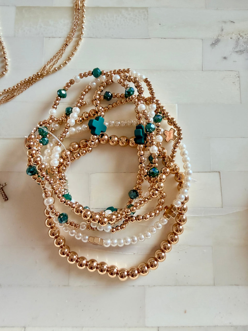 Green bracelet stack