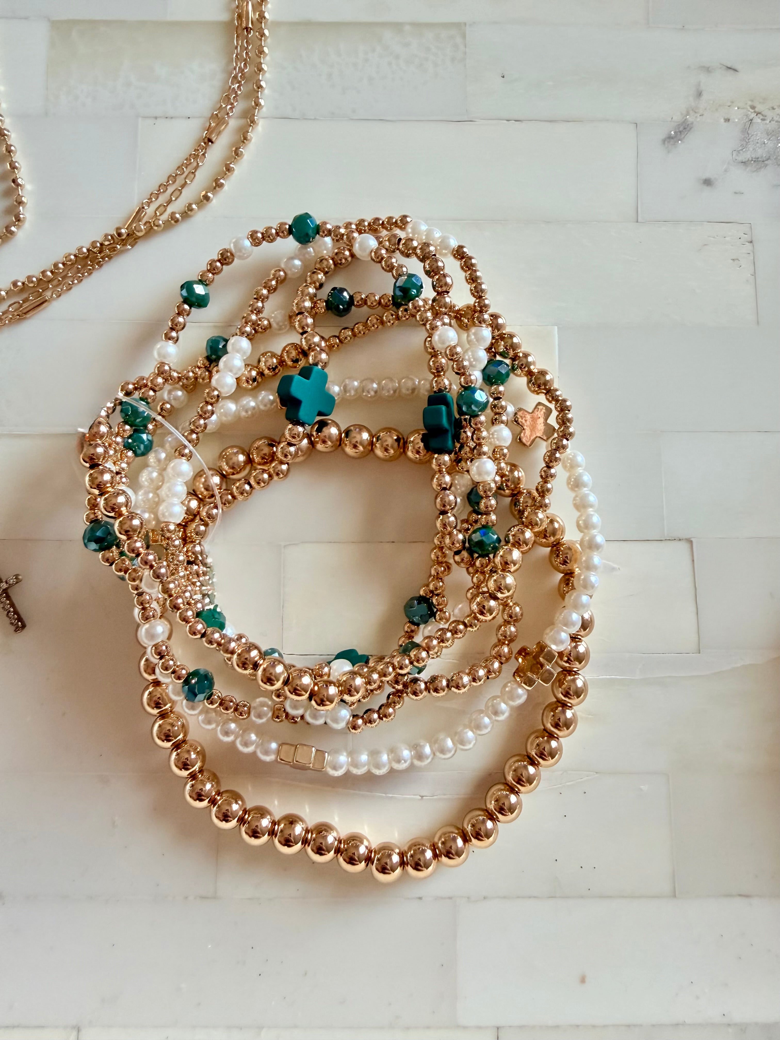 Green bracelet stack